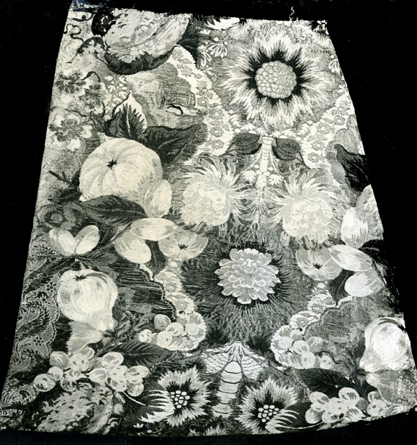A work made of silk, brocaded in silk and metal thread.